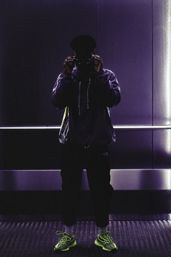 Man Standing Wearing Green Shoes