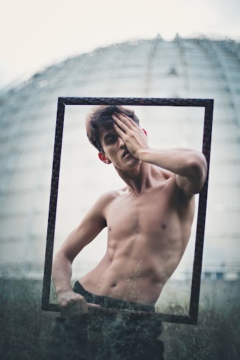 Man Standing While Doing Modeling Pose
