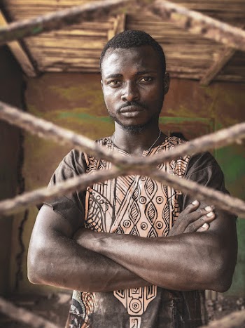 Man Standing With Arms Crossed 