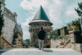 Man Staring at Castle