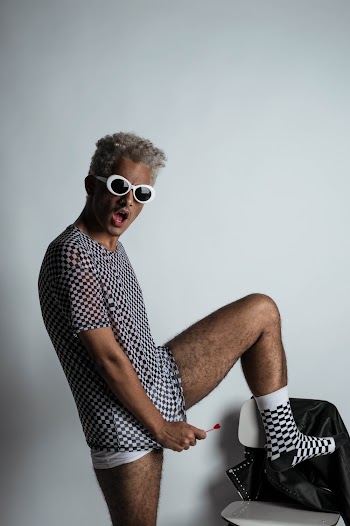 Man Stepping On Chair