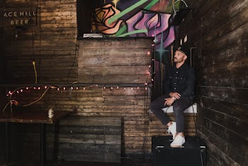 Man Stepping on Speaker