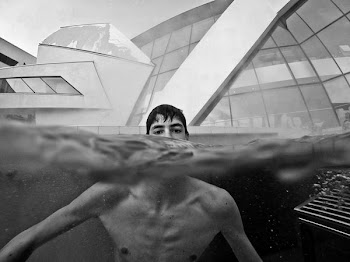 man sticking out head above water