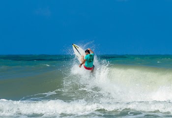 Man Surfboarding on Ocean
