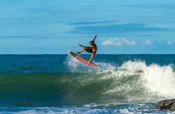 Man Surfing during Day