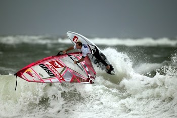 Man Surfing on Waves