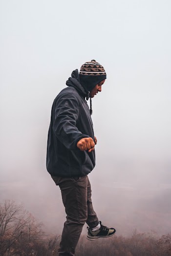 Man Surrounded With White Fog