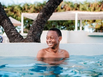 Man Swimming on Pool