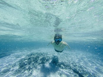 man swimming underwater