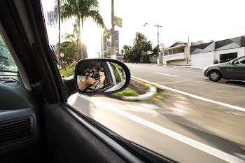 Man Taking A Photo Using Dslr Camera