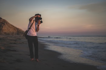 Man Taking Photo Outdoors