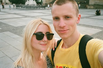 Man Taking Selfie Beside Woman Wearing Sunglasses