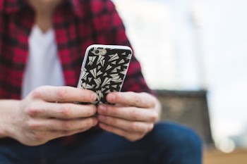 Man Texting iPhone