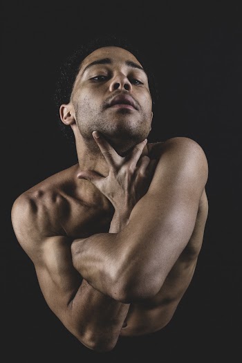 Man Touching His Neck