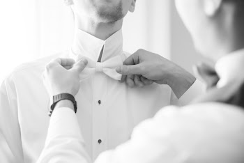 Man Tying Bow Tie