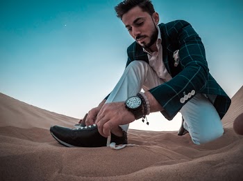 Man Tying His Shoelace