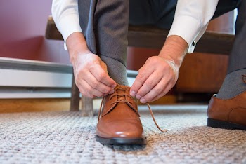 Man Tying Right Shoe