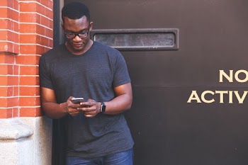          Man Typing on Mobile Phone Free Photo     