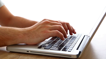 Man typing on modern laptop computer Stock Video Footage ...