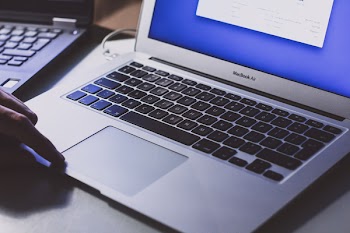 Man using a MacBook 2