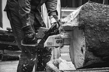 Man using chainsaw