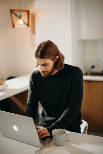 Man Using Macbook