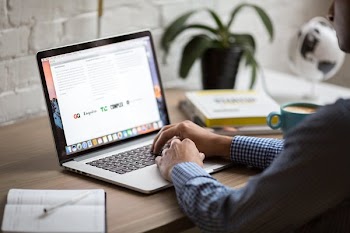 Man Using Macbook Air