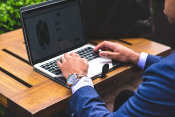 Man Using Macbook Pro