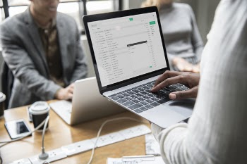Man Using Turned-on Laptop
