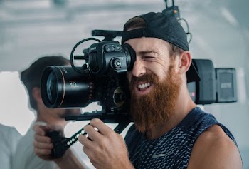 man using video recorder
