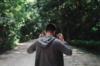 Man Using White Earphones