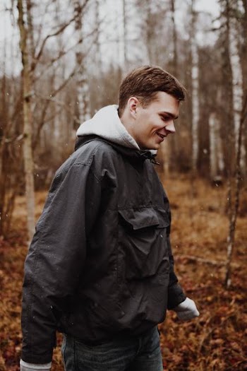 man walking at the forest