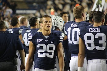 Man Walking Behind His Teammates