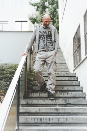 Man Walking Down the Stairs