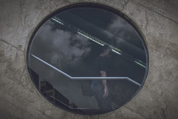 Man Walking Down The Stairs