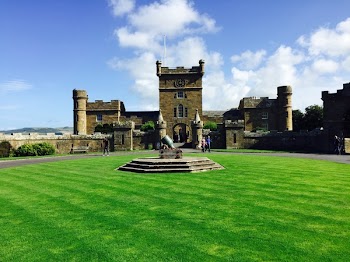 Man Walking Near Castle
