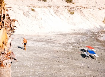 Man Walking Near on Beach