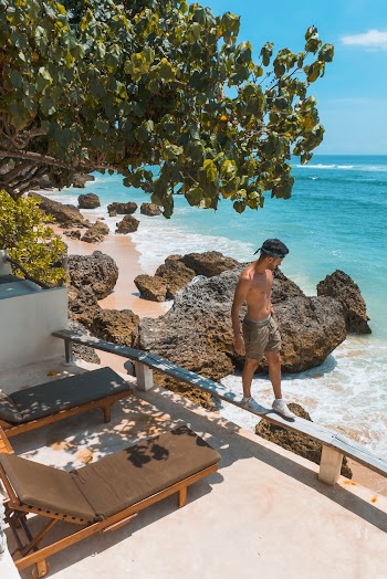Man Walking on Balcony