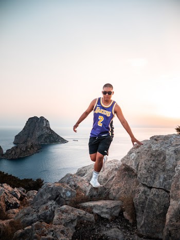 Man Walking on Cliff