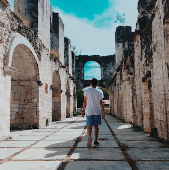 Man Walking on Pathway
