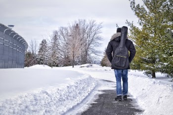 Man Walking On Pathway 