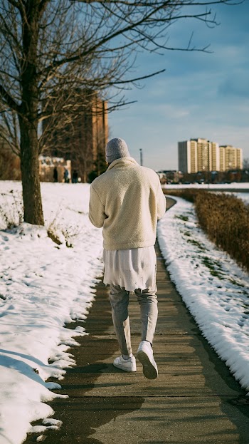 Man Walking On Pathway