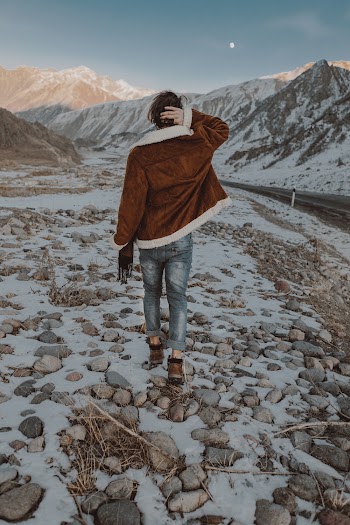 Man Walking on Rocks