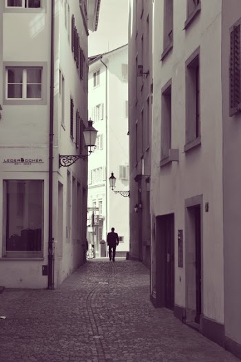 Man Walking on Street Alley