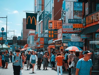 man walking on street during daytime
