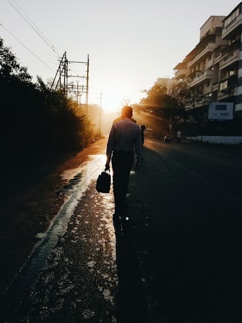 Man Walking on the Street