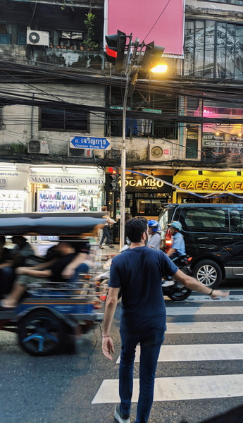 Man Walking Through Pedestrian Lane