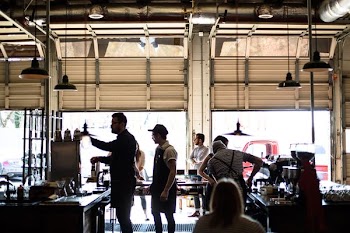 man walking towards table