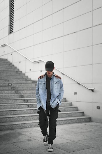 Man Walking With His Head Looking Down