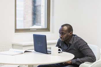 Man Watches Laptop